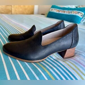 Dansko Black Leather Flats with Minimalist Design